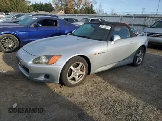 2002 Honda S2000 with VIN JHMAP11412T009944, listed as a Copart auction lot 79018274 with 211,423 mi miles and Salvage Title. Bid and sale history available at DreamBid. Image 1.