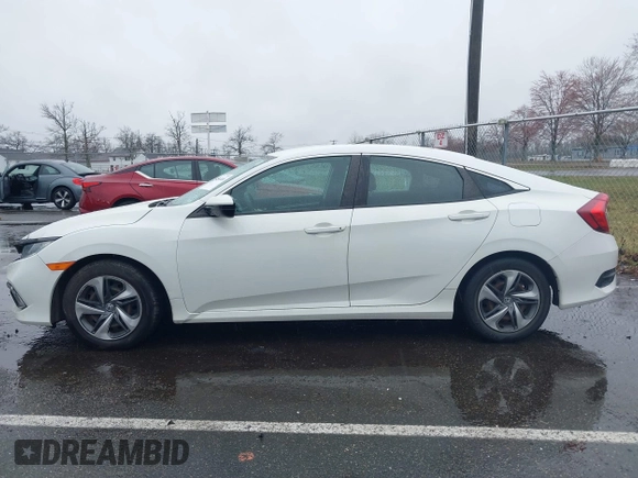 2020 Honda Civic LX with VIN 2HGFC2F66LH510069, listed as a IAAI auction lot 41860480 with 43,639 mi miles and . Bid and sale history available at DreamBid. Image 14.