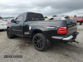 2003 Ford F-150 XL with VIN 1FTRF07W33KB56591, listed as a Copart auction lot 64170993 with 150,941 mi miles and Salvage title. Bid and sale history available at DreamBid. Image 2.