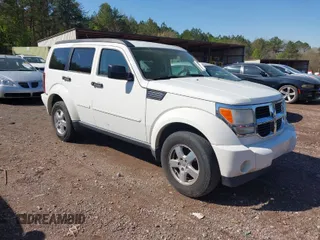 2009 Dodge Nitro SE with VIN 1D8GT28K19W518279, listed as a IAAI auction lot 41855238 with 186,607 mi miles and . Bid and sale history available at DreamBid. Image 1.