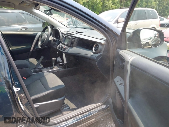2017 Toyota RAV4 LE with VIN JTMBFREV5HJ173180, listed as a IAAI auction lot 42402753 with 97,917 mi miles and . Bid and sale history available at DreamBid. Image 5.