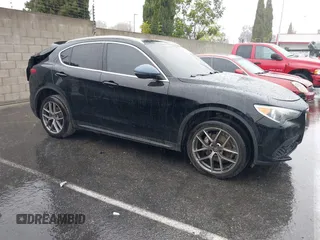 2018 Alfa Romeo Stelvio z VIN ZASFAKANXJ7C23921, wystawiony jako IAAI lot #38783836 z przebiegiem 93 482 mil mil oraz . Historia ofert i sprzedaży dostępna na DreamBid. Obrazek 13.