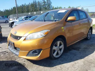 2009 Toyota Matrix S with VIN 2T1LE40E89C009775, listed as a IAAI auction lot 42086039 with 220,832 mi miles. Bid and sale history available at carsss.com. Image 2.