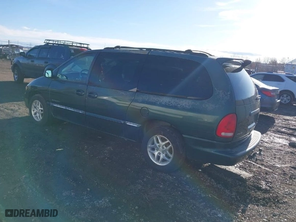 1999 Dodge Caravan SE with VIN 2B4GP44G9XR135970, listed as a IAAI auction lot 41714951 with 173,451 mi miles. Bid and sale history available at carsss.com. Image 3.