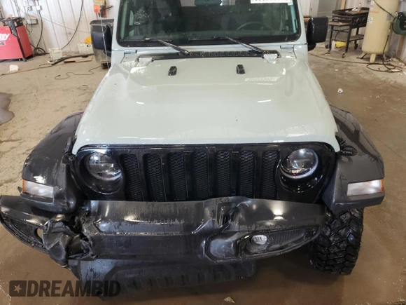 2023 Jeep Wrangler Sport with VIN 1C4HJXAG7PW617021, listed as a Copart auction lot 59928305 with 8,503 mi miles and Salvage title. Bid and sale history available at DreamBid. Image 12.