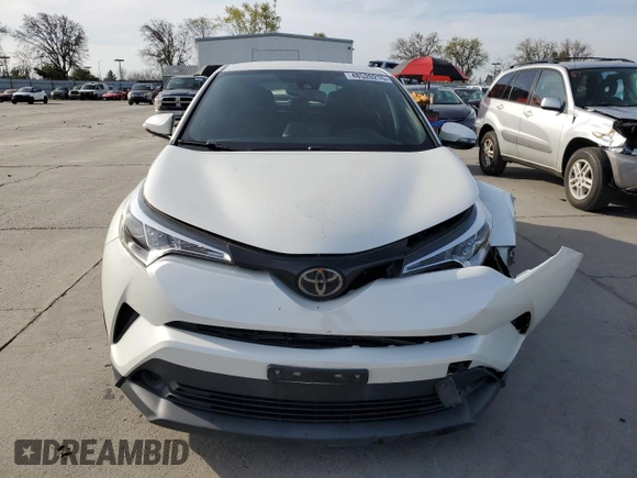 2019 Toyota C-HR XLE with VIN JTNKHMBX3K1036759, listed as a Copart auction lot 48520215 with 56,609 mi miles and Salvage Title. Bid and sale history available at DreamBid. Image 5.
