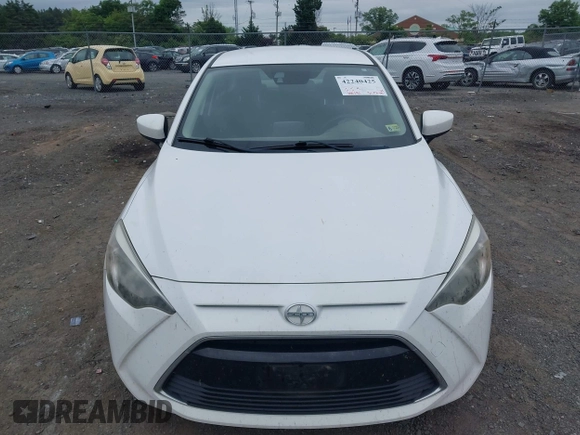 2016 Scion iA z VIN 3MYDLBZV6GY138680, wystawiony jako IAAI lot #42240425 z przebiegiem 100 191 mil mil oraz . Historia ofert i sprzedaży dostępna na DreamBid. Obrazek 12.