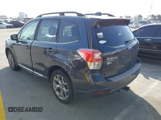 2018 Subaru Forester Touring with VIN JF2SJAWC7JH441559, listed as a IAAI auction lot 41599025 with 105,828 mi miles. Bid and sale history available at carsss.com. Image 3.