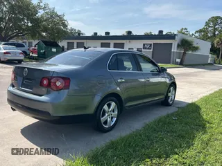 2009 Volkswagen Jetta SE with VIN 3VWRM71K89M145377, listed as a Copart auction lot 66104525 with 161,429 mi miles and Clean title. Bid and sale history available at DreamBid. Image 4.