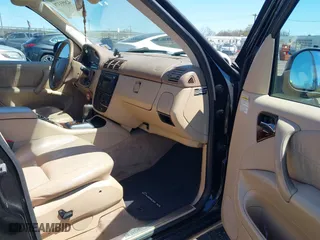 2001 Mercedes-Benz M-Class with VIN 4JGAB54E41A232917, listed as a IAAI auction lot 42055379 with 187,008 mi miles. Bid and sale history available at carsss.com. Image 5.