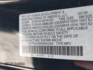 2024 Honda Odyssey Touring z VIN 5FNRL6H89RB042354, wystawiony jako IAAI lot #41469495 z przebiegiem 8 477 mil mil oraz . Historia ofert i sprzedaży dostępna na DreamBid. Obrazek 9.