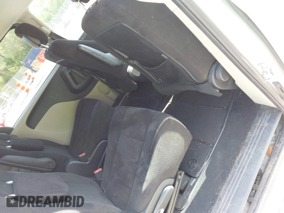 2012 Dodge Grand Caravan SXT with VIN 2C4RDGCG0CR284124, listed as a IAAI auction lot 42103224 with 131,691 mi miles and . Bid and sale history available at DreamBid. Image 8.