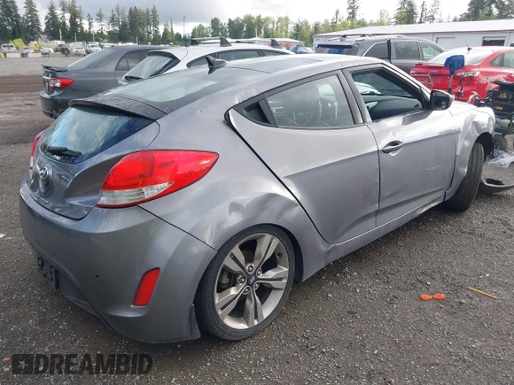 2012 Hyundai Veloster w/Gray Int z VIN KMHTC6AD9CU069416, wystawiony jako IAAI lot #42314080 z przebiegiem Nie podano mil oraz . Historia ofert i sprzedaży dostępna na DreamBid. Obrazek 4.