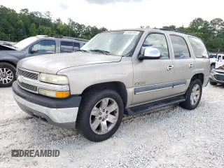 2002 Chevrolet Tahoe LS with VIN 1GNEC13V82J201885, listed as a Copart auction lot 61088785 with 328,639 mi miles and Salvage title. Bid and sale history available at DreamBid. Image 1.