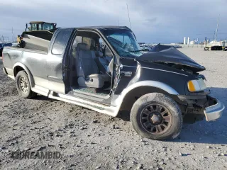 2002 Ford F-150 XL with VIN 1FTRX17LX2NB11895, listed as a Copart auction lot 47850565 with Not provided miles and Salvage title. Bid and sale history available at DreamBid. Image 4.