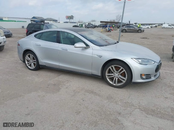 2013 Tesla Model S with VIN 5YJSA1CG3DFP28908, listed as a IAAI auction lot 41804041 with 140,756 mi miles. Bid and sale history available at carsss.com. Image 13.