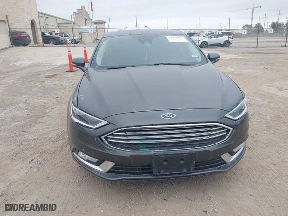 2017 Ford Fusion Energi Titanium with VIN 3FA6P0SU8HR104727, listed as a IAAI auction lot 41242482 with 83,021 mi miles. Bid and sale history available at carsss.com. Image 13.