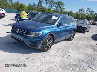 2019 Volkswagen Tiguan SE with VIN 3VV3B7AX2KM006055, listed as a IAAI auction lot 42023713 with 83,570 mi miles and . Bid and sale history available at DreamBid. Image 18.