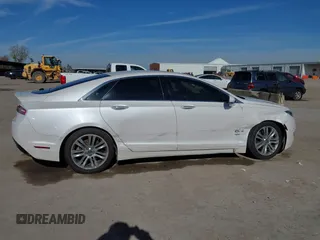 2016 Lincoln MKZ with VIN 3LN6L2G97GR611151, listed as a IAAI auction lot 41354637 with 113,787 mi miles and . Bid and sale history available at DreamBid. Image 6.