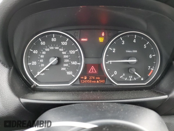 2012 BMW 1 Series 128i with VIN WBAUP7C55CVM54987, listed as a Copart auction lot 76133874 with 124,958 mi miles and Salvage title. Bid and sale history available at DreamBid. Image 9.