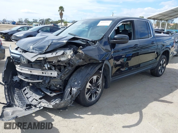 2020 Honda Ridgeline RTL with VIN 5FPYK3F53LB030107, listed as a IAAI auction lot 41933517 with 93,373 mi miles and . Bid and sale history available at DreamBid. Image 17.