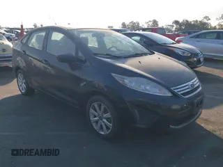 2011 Ford Fiesta SE with VIN 3FADP4BJ1BM216925, listed as a IAAI auction lot 41407030 with 108,459 mi miles. Bid and sale history available at carsss.com. Image 1.