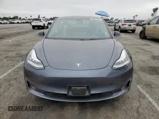 2020 Tesla Model 3 Standard Range Plus z VIN 5YJ3E1EA2LF704941, wystawiony jako Copart lot #58938485 z przebiegiem 34 851 mil mil oraz Szkoda całkowita • Salvage title. Historia ofert i sprzedaży dostępna na DreamBid. Obrazek 5.