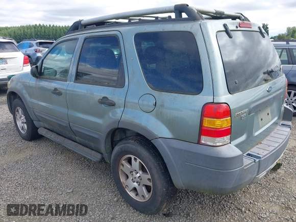 2005 Ford Escape XLT z VIN 1FMYU931X5KA69477, wystawiony jako IAAI lot #42576724 z przebiegiem 143 747 mil mil oraz . Historia ofert i sprzedaży dostępna na DreamBid. Obrazek 3.