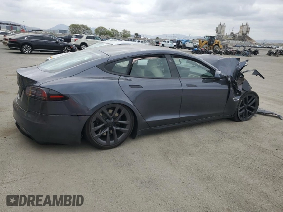 2022 Tesla Model S with VIN 5YJSA1E5XNF474238, listed as a Copart auction lot 54220115 with Not provided miles and Salvage title. Bid and sale history available at DreamBid. Image 3.