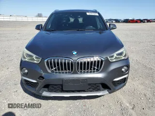 2016 BMW X1 xDrive28i z VIN WBXHT3C37G5E51737, wystawiony jako Copart lot #52441845 z przebiegiem 91 910 mil mil oraz Szkoda całkowita • Salvage title. Historia ofert i sprzedaży dostępna na DreamBid. Obrazek 5.