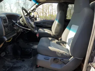 1999 Ford Super Duty F-250 XL with VIN 1FTNX21L5XEA67499, listed as a Copart auction lot 50822095 with 480,067 mi miles and Salvage Title. Bid and sale history available at carsss.com. Image 7.
