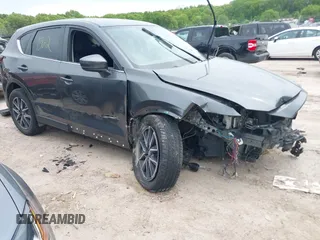 2018 Mazda CX-5 Touring z VIN JM3KFBCM4J0457307, wystawiony jako IAAI lot #42351562 z przebiegiem Nie podano mil oraz . Historia ofert i sprzedaży dostępna na DreamBid. Obrazek 1.