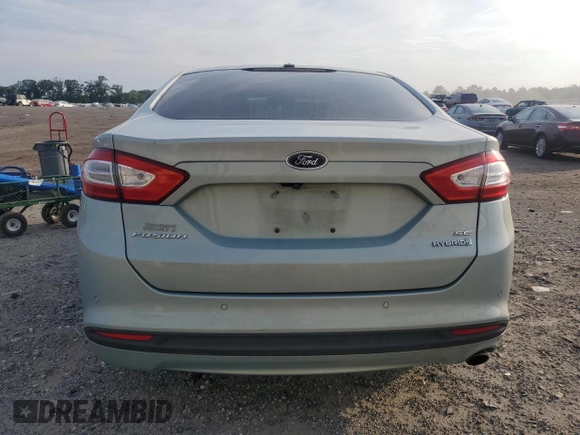 2013 Ford Fusion SE Hybrid z VIN 3FA6P0LU7DR368711, wystawiony jako Copart lot #62367685 z przebiegiem 155 284 mil mil oraz Czysty tytuł • Clean title. Historia ofert i sprzedaży dostępna na DreamBid. Obrazek 6.