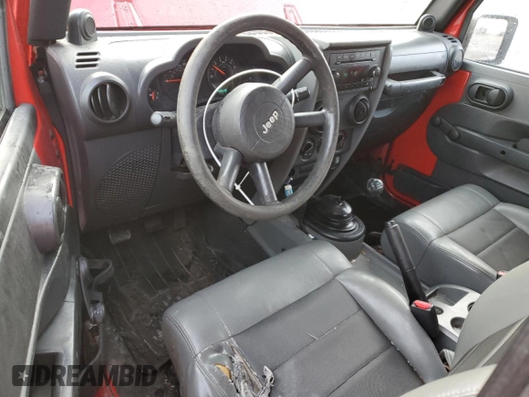2009 Jeep Wrangler X with VIN 1J4FA24149L760959, listed as a Copart auction lot 49425955 with 128,813 mi miles and Salvage Title. Bid and sale history available at DreamBid. Image 8.