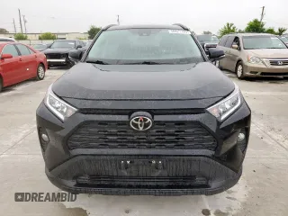 2021 Toyota RAV4 XLE with VIN 2T3W1RFV0MW149640, listed as a Copart auction lot 58821125 with 105,483 mi miles and Salvage title. Bid and sale history available at DreamBid. Image 5.