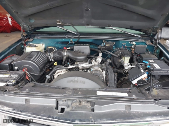 1997 Chevrolet Tahoe with VIN 1GNEK13R8VJ411512, listed as a IAAI auction lot 41583085 with 239,481 mi miles. Bid and sale history available at carsss.com. Image 10.