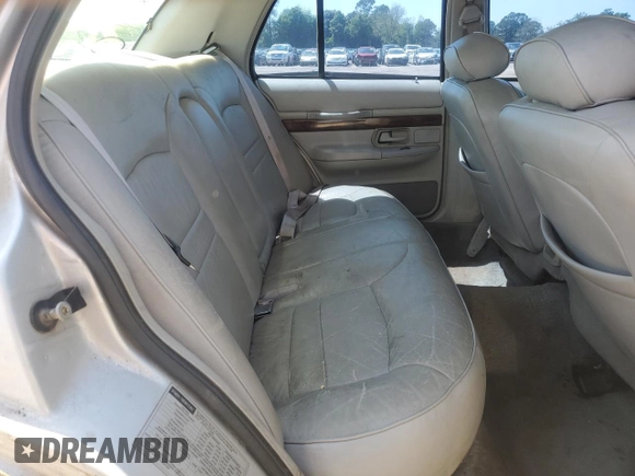 1999 Mercury Grand Marquis LS z VIN 2MEFM75W5XX673218, wystawiony jako Copart lot #52621285 z przebiegiem 163 642 mil mil oraz Szkoda całkowita • Salvage title. Historia ofert i sprzedaży dostępna na DreamBid. Obrazek 10.