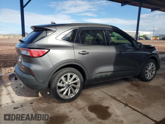 2021 Ford Escape Titanium with VIN 1FMCU9J92MUA08792, listed as a Copart auction lot 59270215 with 29,194 mi miles and Salvage title. Bid and sale history available at DreamBid. Image 3.