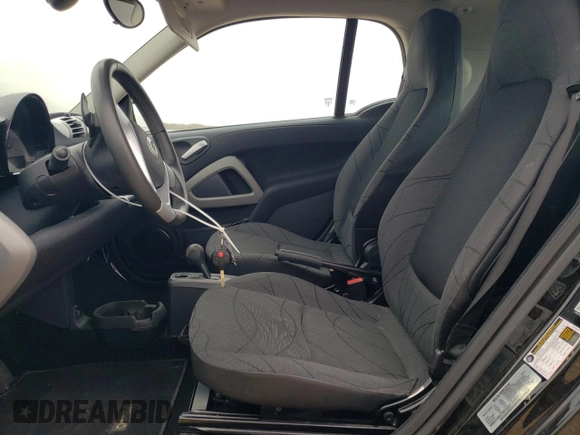 2015 Smart fortwo Passion z VIN WMEEJ3BA2FK815423, wystawiony jako Copart lot #42573045 z przebiegiem 11 588 mil mil oraz Szkoda całkowita • Salvage title. Historia ofert i sprzedaży dostępna na DreamBid. Obrazek 7.