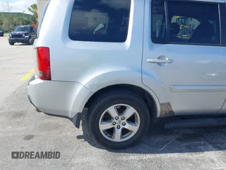2010 Honda Pilot EX with VIN 5FNYF3H43AB020482, listed as a IAAI auction lot 42077230 with 229,418 mi miles and . Bid and sale history available at carsss.com. Image 6.