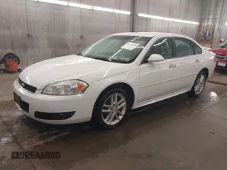 2012 Chevrolet Impala LTZ with VIN 2G1WC5E33C1331027, listed as a IAAI auction lot 42170924 with 211,065 mi miles and . Bid and sale history available at DreamBid. Image 2.