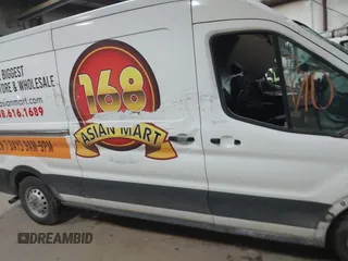 2020 Ford Transit Cargo z VIN 1FTBR2C81LKA68599, wystawiony jako IAAI lot #41381157 z przebiegiem 63 382 mil mil oraz . Historia ofert i sprzedaży dostępna na DreamBid. Obrazek 13.