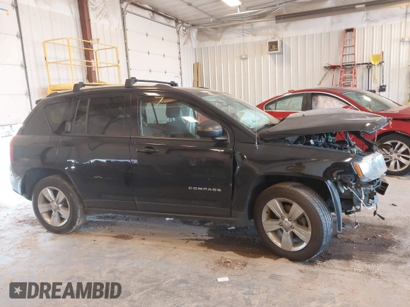 2016 Jeep Compass Sport z VIN 1C4NJCBA7GD621393, wystawiony jako IAAI lot #42640609 z przebiegiem 130 885 mil mil oraz . Historia ofert i sprzedaży dostępna na DreamBid. Obrazek 13.