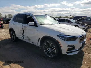 2021 BMW X5 xDrive40i with VIN 5UXCR6C09M9F71460, listed as a Copart auction lot 73531444 with 26,066 mi miles and Salvage title. Bid and sale history available at DreamBid. Image 4.