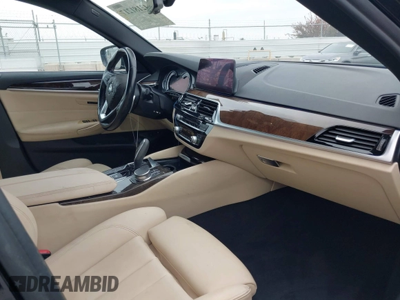 2019 BMW 5 Series 530e with VIN WBAJA9C56KB388241, listed as a IAAI auction lot 42181217 with 69,805 mi miles and . Bid and sale history available at carsss.com. Image 5.