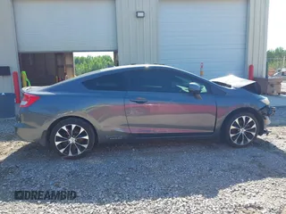 2013 Honda Civic Si z VIN 2HGFG4A58DH703047, wystawiony jako IAAI lot #42177965 z przebiegiem Nie podano mil oraz . Historia ofert i sprzedaży dostępna na DreamBid. Obrazek 14.