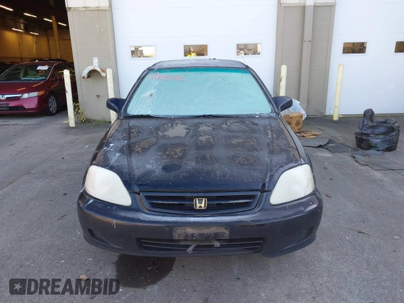 1999 Honda Civic HX with VIN 1HGEJ7120XL038544, listed as a IAAI auction lot 41425202 with 336,033 mi miles. Bid and sale history available at carsss.com. Image 12.
