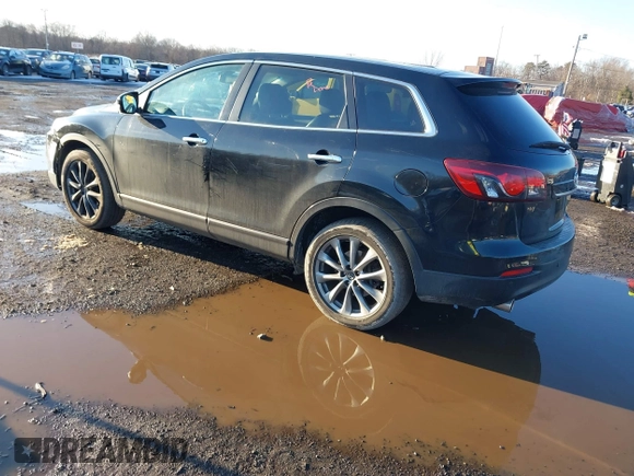 2014 Mazda CX-9 Grand Touring with VIN JM3TB3DV4E0444558, listed as a IAAI auction lot 41538130 with 113,050 mi miles and . Bid and sale history available at DreamBid. Image 3.
