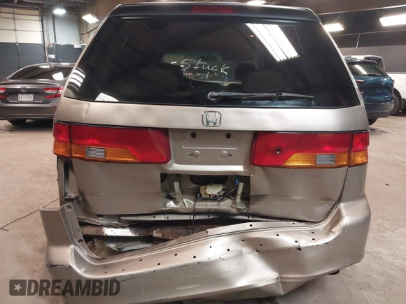 2004 Honda Odyssey LX with VIN 5FNRL18534B072936, listed as a IAAI auction lot 42366971 with 185,534 mi miles and . Bid and sale history available at DreamBid. Image 16.