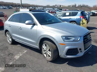 2016 Audi Q3 Premium Plus z VIN WA1EFCFS1GR016996, wystawiony jako IAAI lot #41942380 z przebiegiem 90 852 mil mil oraz . Historia ofert i sprzedaży dostępna na DreamBid. Obrazek 1.